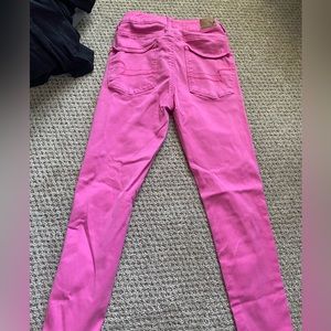 Pink colored American Eagle high rise jegging
